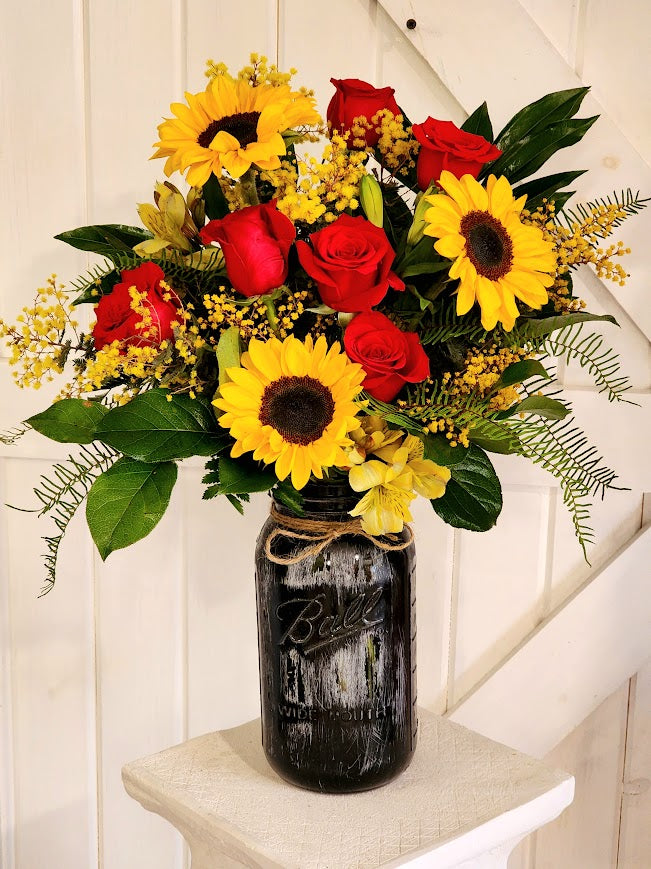 Guns And Roses Mason Jar Arrangement