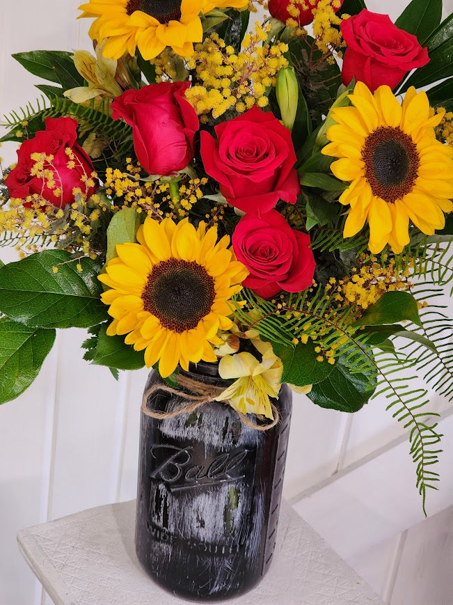 Guns And Roses Mason Jar Arrangement